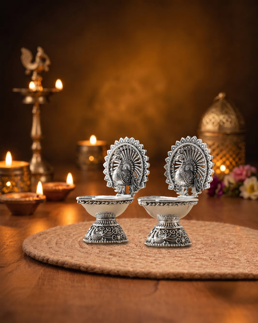 Handcrafted Peacock Deepam Pair in Brass with Premium Silver Finish | Traditional Pooja Oil Lamps